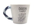 White mug with blue handle featuring 'Daddy is my hero!' text and paw print design on a white background