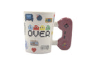 Mug with game-themed design and controller handle on a white background