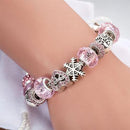 Charming Soft Pink and Silver colour bracelet with heart and snow flake themed charms Jewellery & Watches Iconix