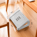 Adjustable under desk massage footrest