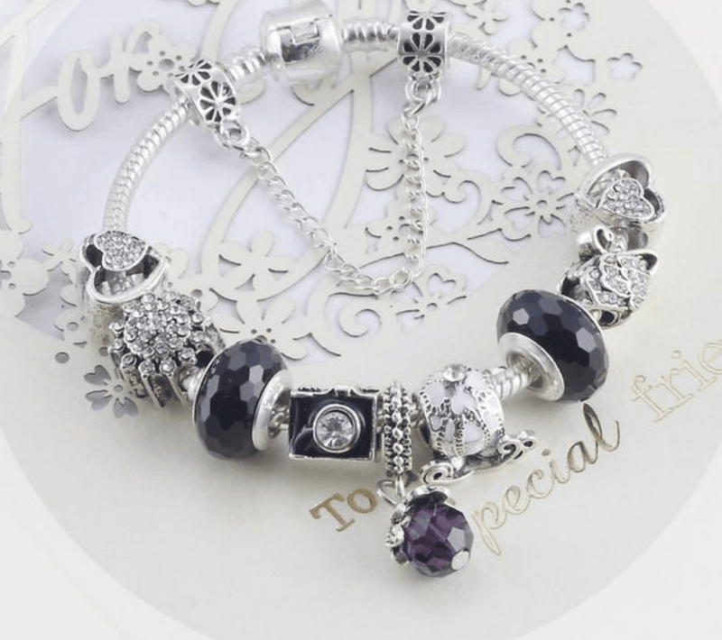 Charming Black and Silver colour bracelet with Heart themed charms Jewellery & Watches Iconix 