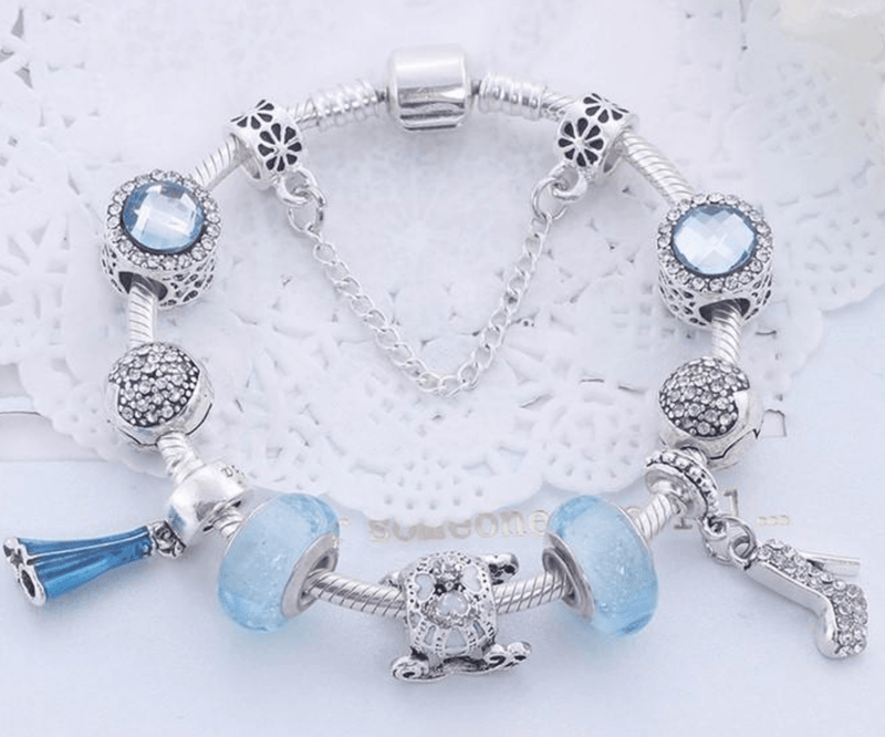 Charming Light Blue and Silver colour bracelet with Fashion themed charms Jewellery & Watches Iconix 