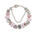 Charming Soft Pink and Silver colour bracelet with heart and snow flake themed charms Jewellery & Watches Iconix 